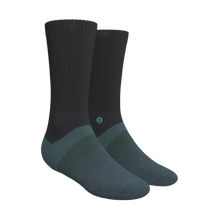Load image into Gallery viewer, A pair of Heel Hammock‚Ñ¢ crew socks with logo detail.