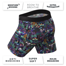 Load image into Gallery viewer, A pair of men's underwear with cartoon characters, a black fabric, and a sign.