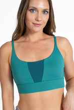 Load image into Gallery viewer, A woman in a cooling bralette, close-up of clothing details.