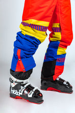 Load image into Gallery viewer, The Hot Tub Time Machine | Men&#39;s 80s Ski Suit, a person in ski pants and colorful snow suit, close-ups of ski boot and boot details.
