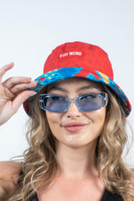 Load image into Gallery viewer, A woman in a reversible Shinesty bucket hat and sunglasses, exuding a fun and carefree vibe.
