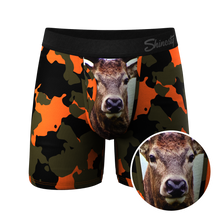 Load image into Gallery viewer, A close-up of camo deer boxers with a unique design.
