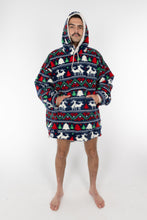 Load image into Gallery viewer, A man in The Caribou Lous | Reversible Christmas Fur Hoodie with hands in pockets, hood up, cozy and stylish.
