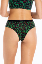 Load image into Gallery viewer, A woman wearing The Kiss Me There Mistletoe Cheeky Underwear.
