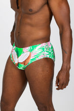 Load image into Gallery viewer, A man in The Pi√±a Colada | Tropical Coconuts Swim Brief.
