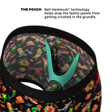 Load image into Gallery viewer, Close-up of a pirate-themed bag with sailor tattoos and a dice drawing, part of The Tight Ship Ball Hammock¬Æ Pouch Underwear collection.
