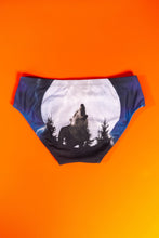 Load image into Gallery viewer, The Truck Stop Classic | Gas Station Wolf Swim Brief featuring a howling wolf design.

