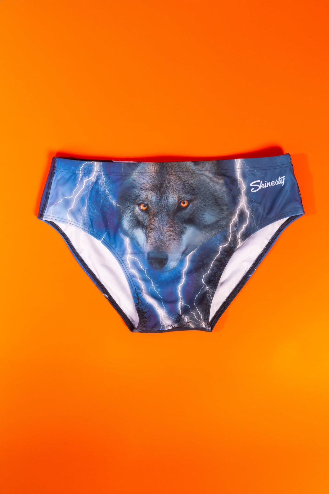A wolf face swim brief inspired by middle school tees.